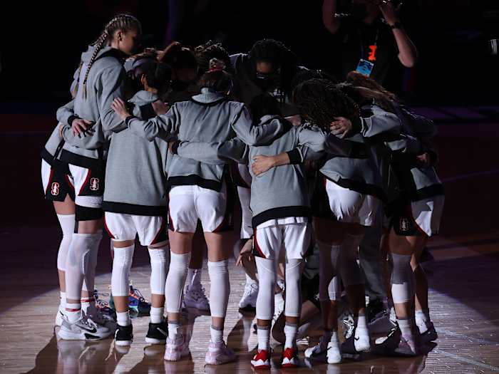 Stanford Cardinal players huddle on the court prior to their game against the Arizona Wildcats in the national championship game of the women's Final Four of the 2021 NCAA Tournament at Alamodome.